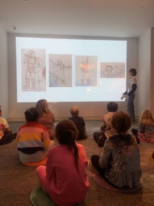 Sharing artwork during Story Time at the CAT